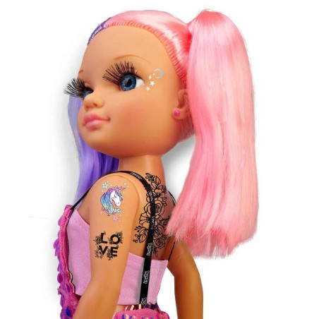 NANCY CADA DIA UN TATTOO
